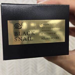 Holika Holika Prime Youth Black Snail Face Cream - Black and Gold. From KOREA